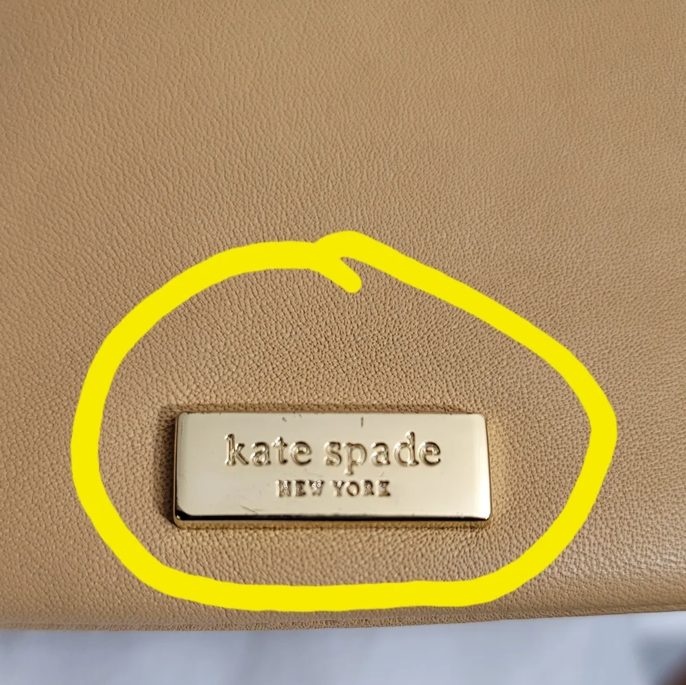 Kate spade New York Creamy Caramel Brown Wristlet.